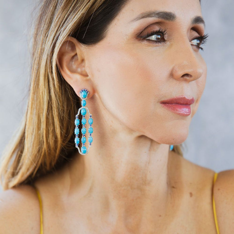 Sleeping Beauty Turquoise with  Blue Sapphire & Diamond Dangle Earrings. This pair of earrings are perfect for special occasions. 