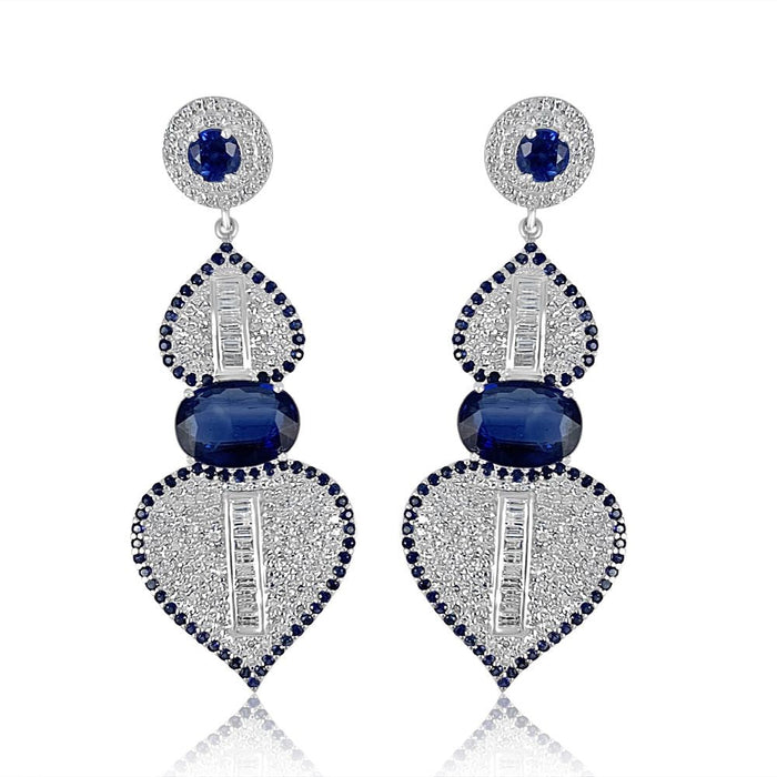 Kyanite with Diamonds & Baguette Spade Earrings  Diamonds: 3.73 ct Baguettes: 1.65 ct Kyanite: 8.98 ct Silver with Rhodium Plated weight: 13.19 grams Gold Post: 0.16 grams